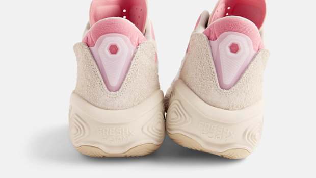 Rear view of Zach LaVine's tan and pink New Balance shoes.